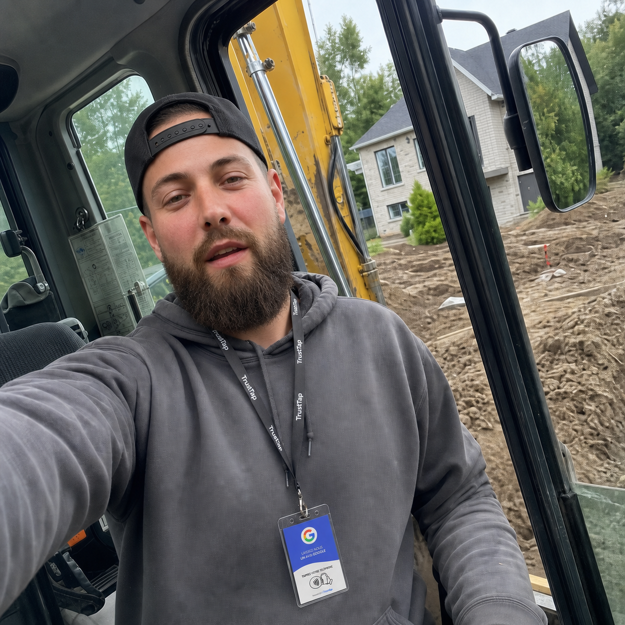 Un entrepreneur porte son badge TrustTap dans une excavatrice