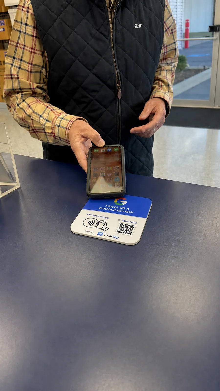 Customer using an English TrustTap plate